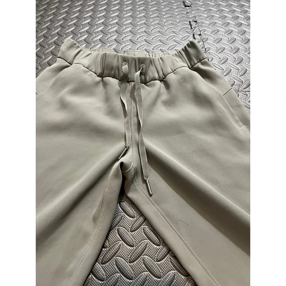 Lululemon On The Fly Jogger Green Gray Athletic Pants Womens Size 2 LW5BZDS